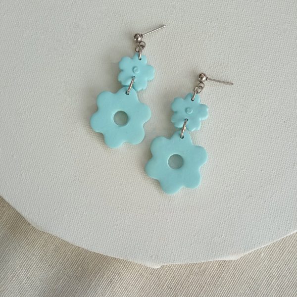 Light blue flowers dangle earrings