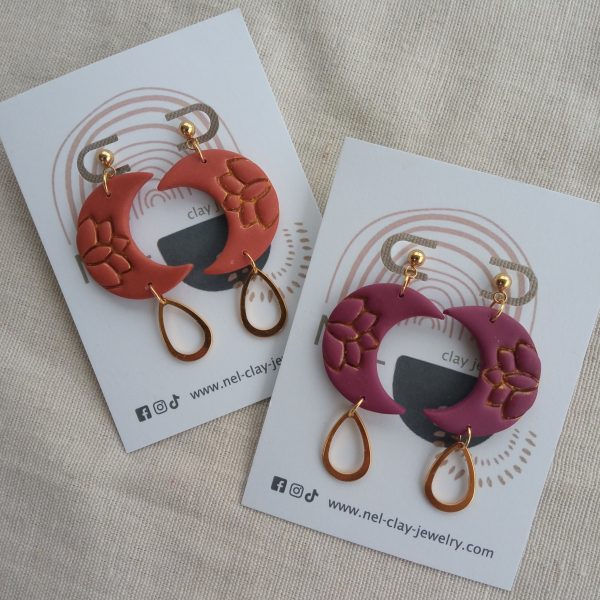 Crescent and lotus dangle earrings