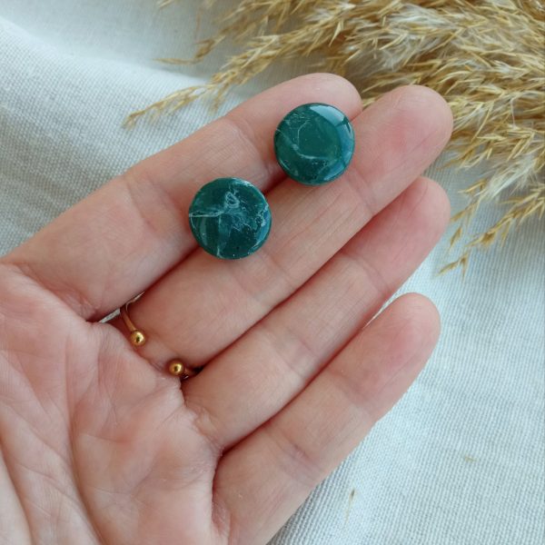 Dark green circular studs