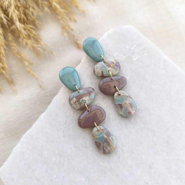 Marbled pale turquoise and mocca organic shaped dangles