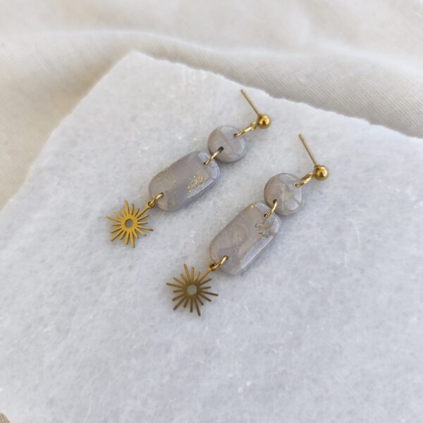 Beige and gold long dangles