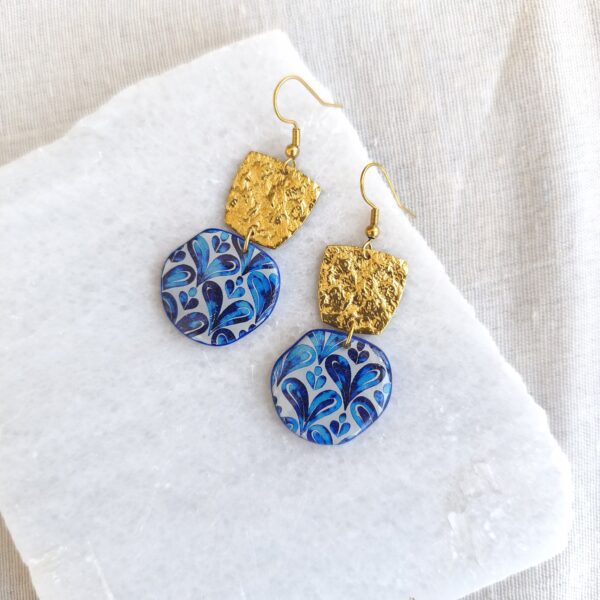 Nel Clay Jewelry - Homepage 3 Patterned blue earrings with gold trapezoid charms